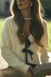 Moxidress V Neck Bow Tie Front Elegant Sweater