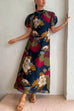 Moxidress Puff Sleeve Cut Out Waist Floral Maxi Swing Dress